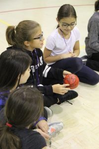 Children at the English Montreal School Board playing Equitas Play it Fair activities in a gymnasium